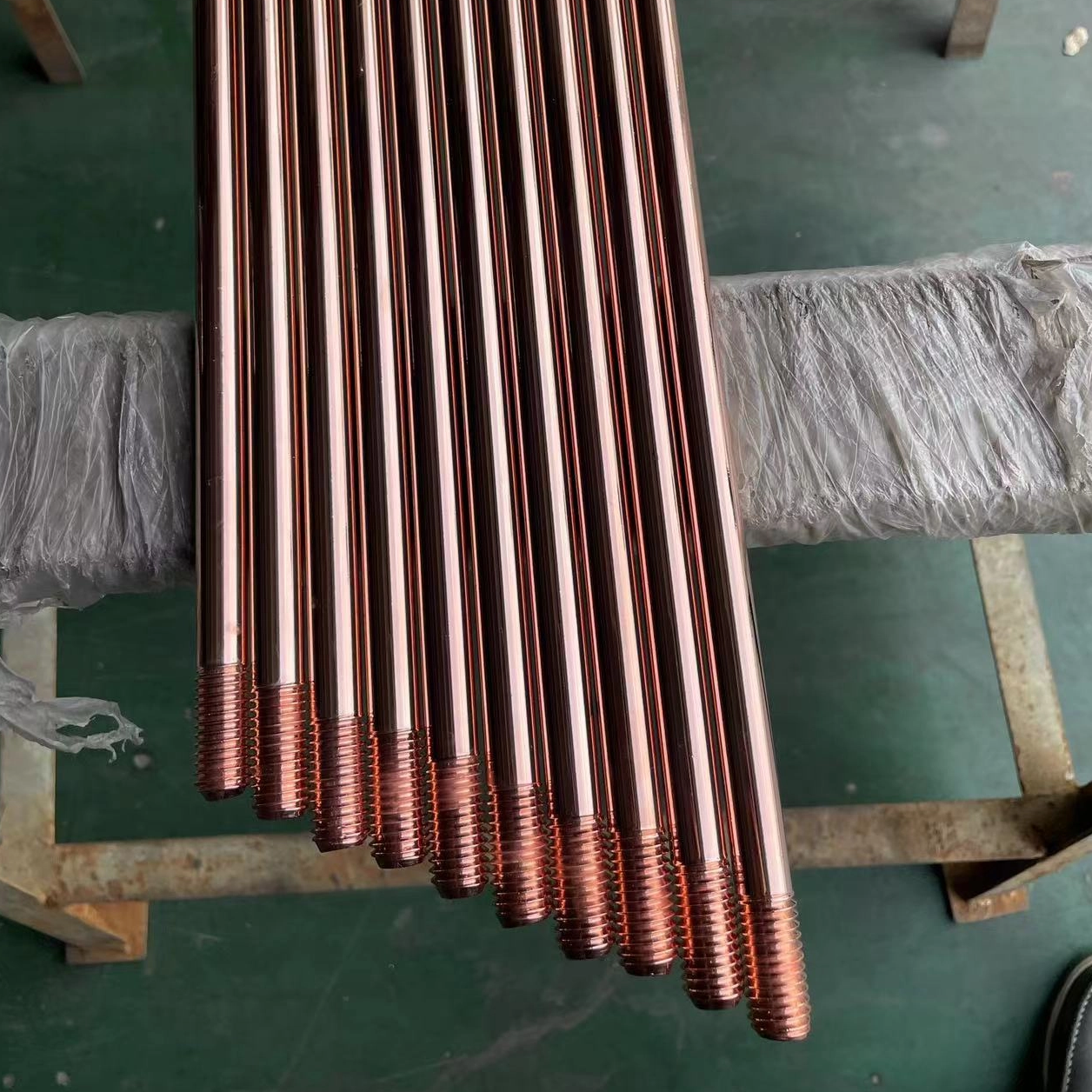 What kind of steel is used for pipes?